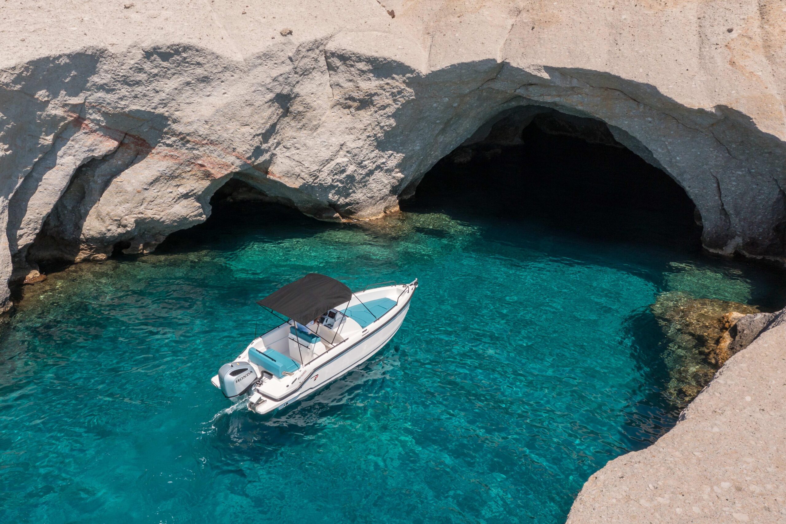 A private boat day across Kleftiko, Sykia, Kimolos and Poliegos in the Milos archipelago